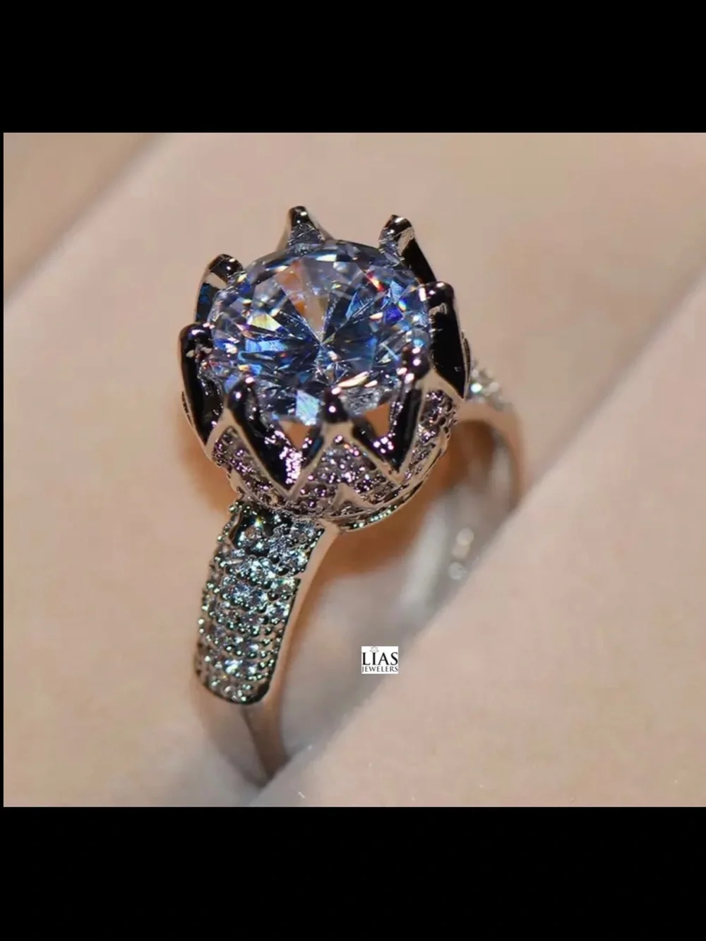 New 18k white gold engagement ring